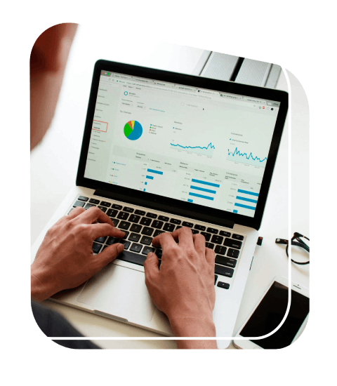 Analyzing data on laptop screen

